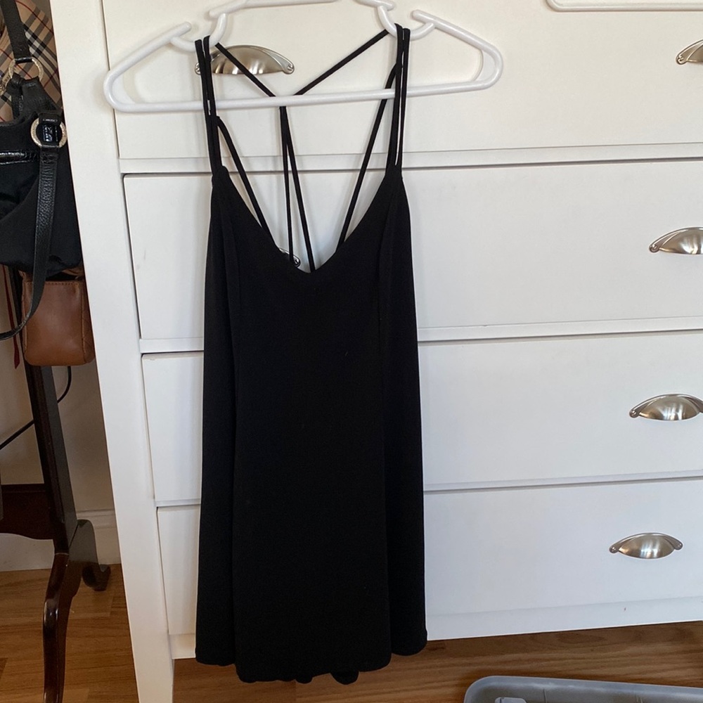 Strapping black mini dress